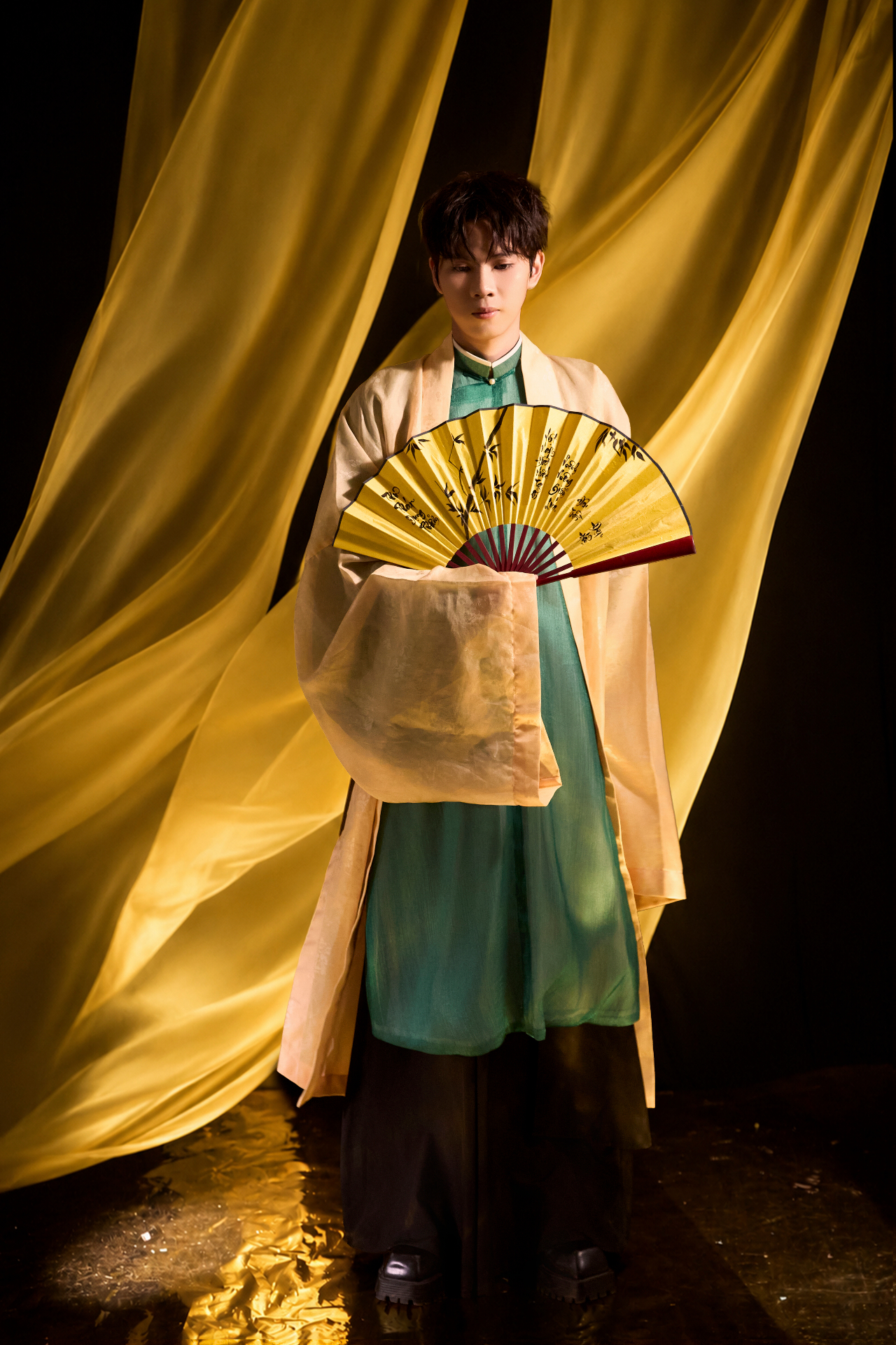 Sylvanus Finnian — composer, holding moon lute in jade silk robes