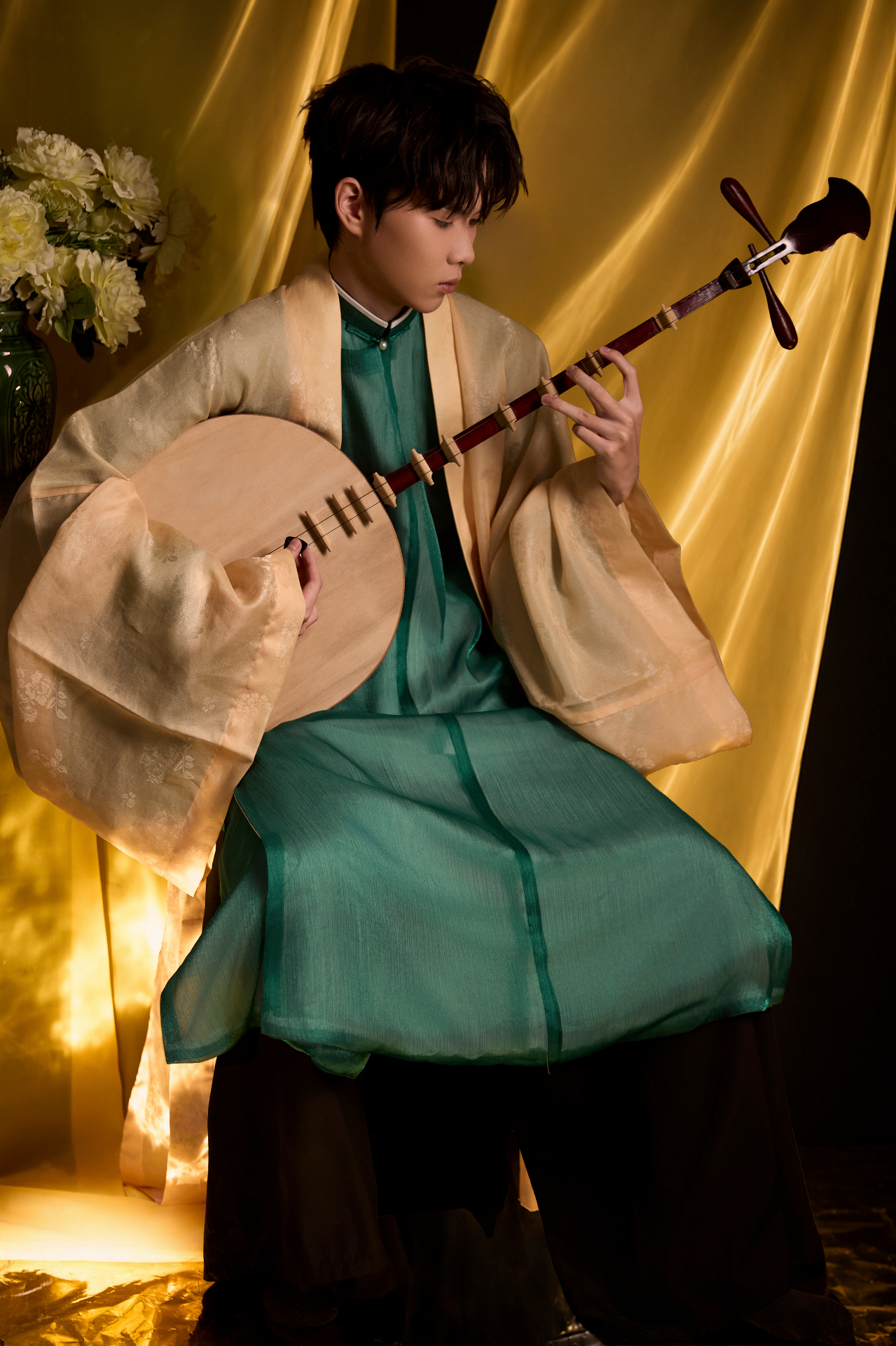 Sylvanus Finnian — Vietnamese composer, holding a moon lute in jade silk robes
